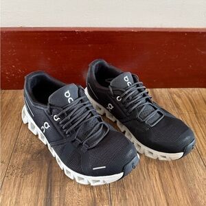 On Running womans Black and White Athletic Shoes